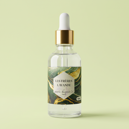 Lavender & Bergamot Oil 50 ml bottle on a soft citrus green background