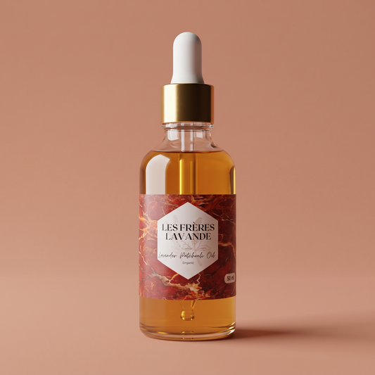 Lavender & Patchouli Oil 50 ml bottle on a soft terracotta background