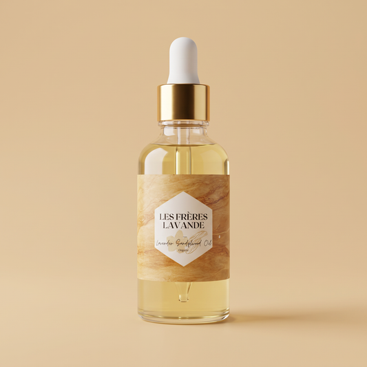 Lavender & Sandalwood Oil 50 ml bottle on a warm sand background
